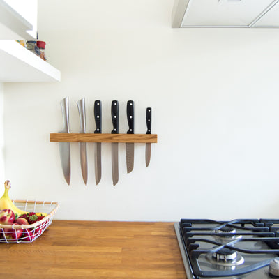 Kitchen knives being showcased in a floating knife holder